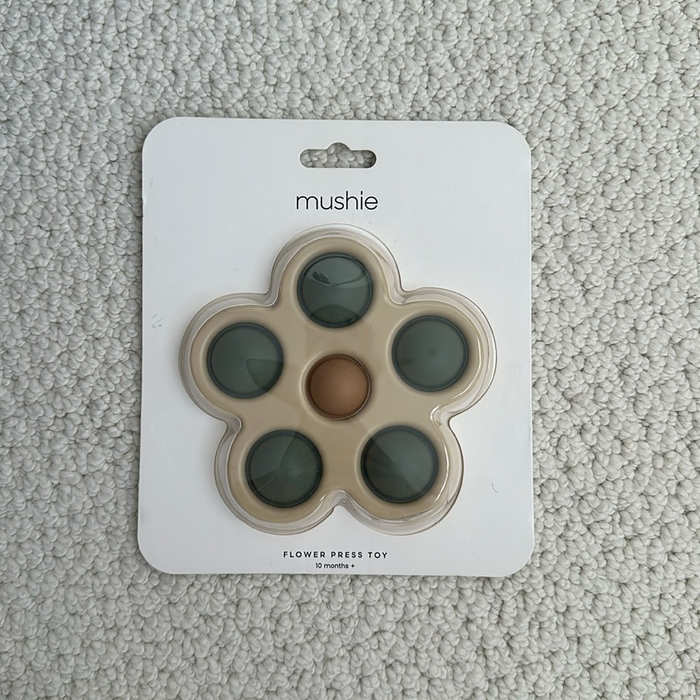 Mushie flower press toy